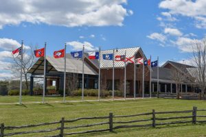 bick building with a line of flags