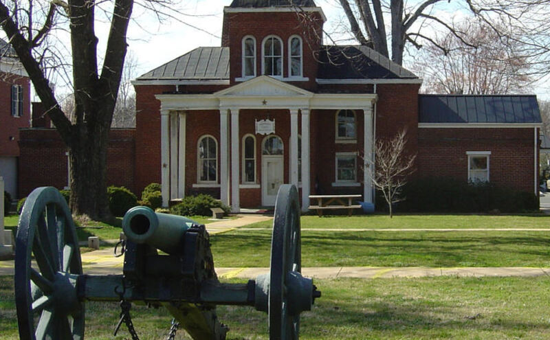 brick building with white portico