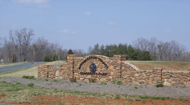 Entrance to park with decorative stone wall