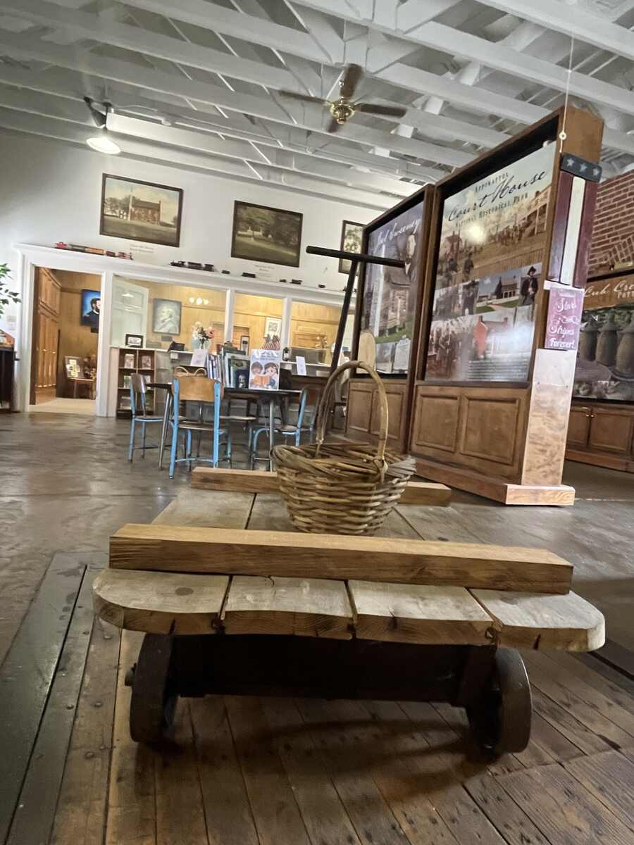 Basket on wooden platform with wheels