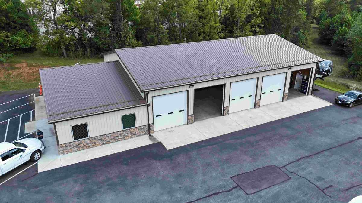 Building with 5 garage doors and grey roof