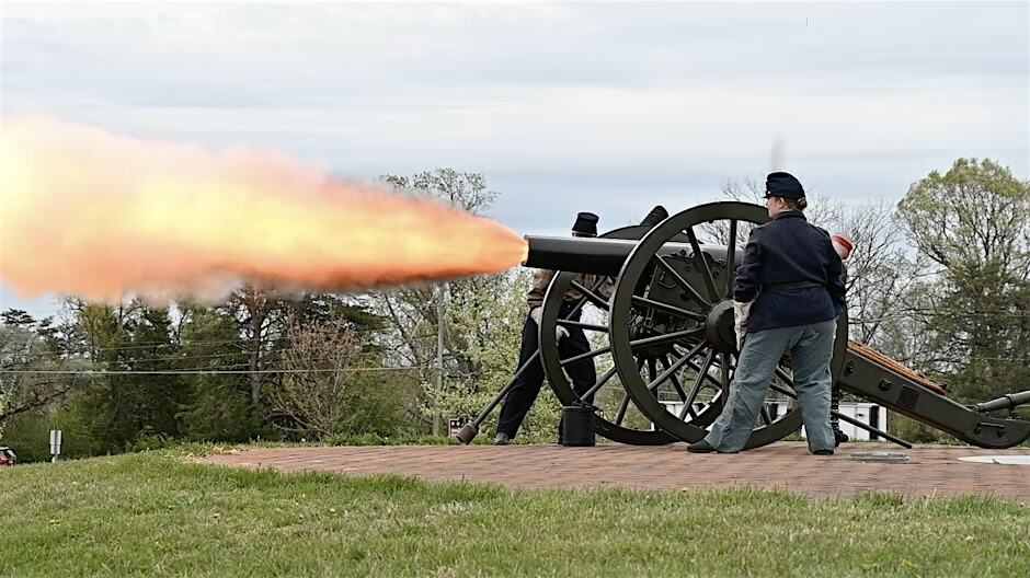 Soldiers firing cannon