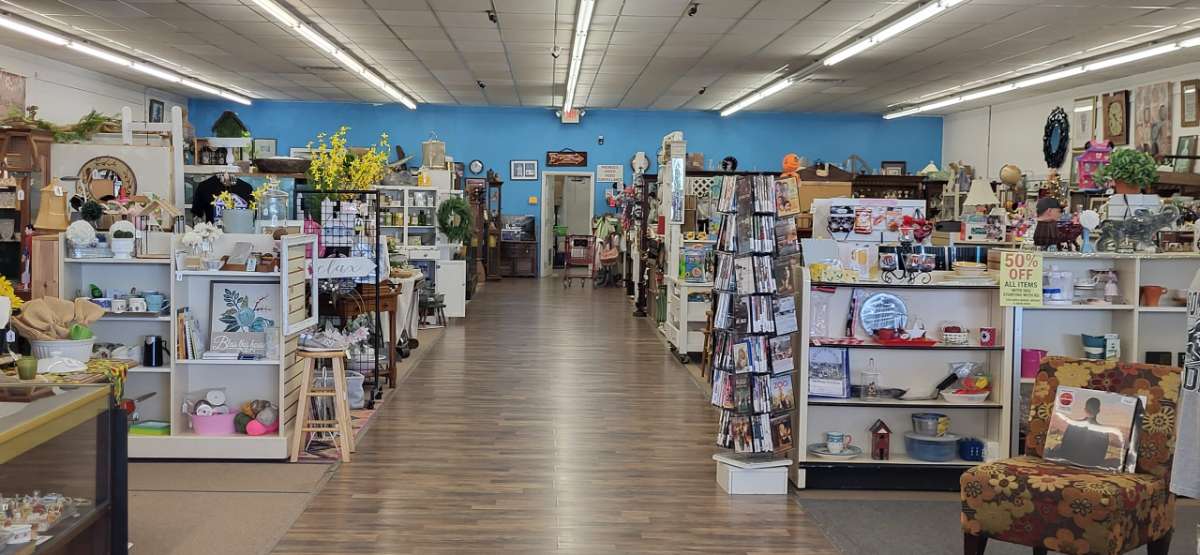 store aisle with filled shelves
