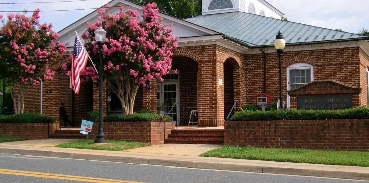 Brick building with flowering trees