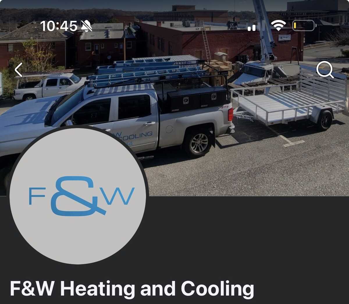 F&W Heating and Cooling logo over picture of truck and trailer