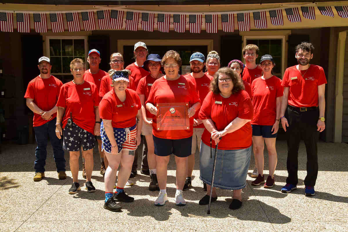 Group of people in red t shirts.
