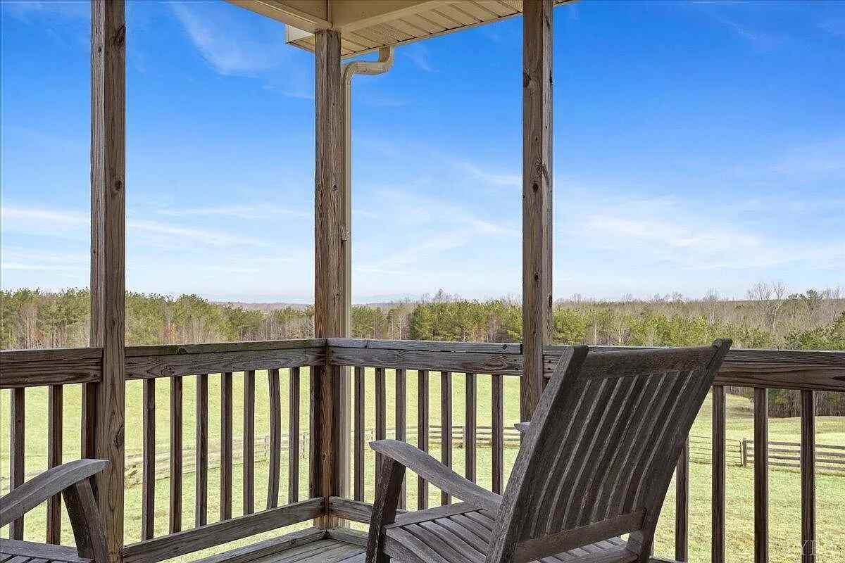 View from porch with wood chairs
